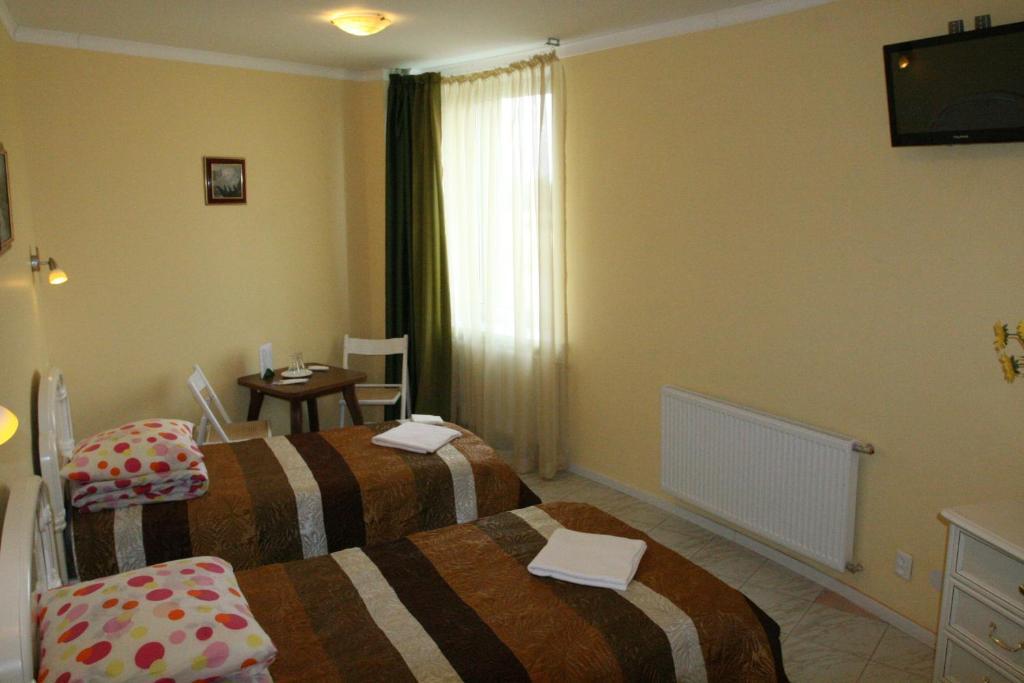 Vaivorykste Hotel Šiauliai Kamer foto